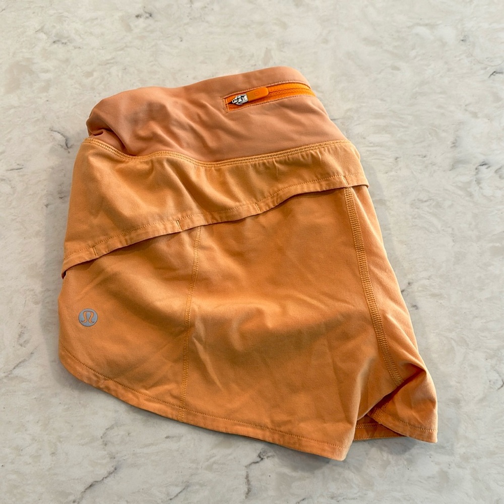 Orange Lululemon Speed-Up shorts 2.5” Good Condition